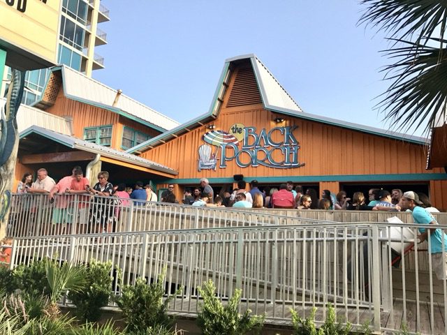People waiting to eat at the Back Porch in Destin 