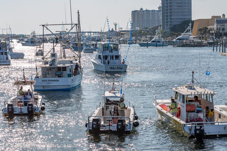 Boats lined up in the harbor at Destin's Blessing of the Fleet event