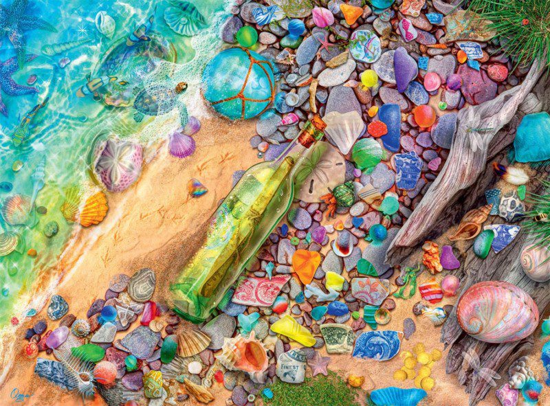 Beach scene of sea glass and shells on a jigsaw puzzle