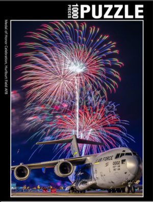 Hurlburt Field Plane with Fireworks behind it on a jigsaw puzzle box cover