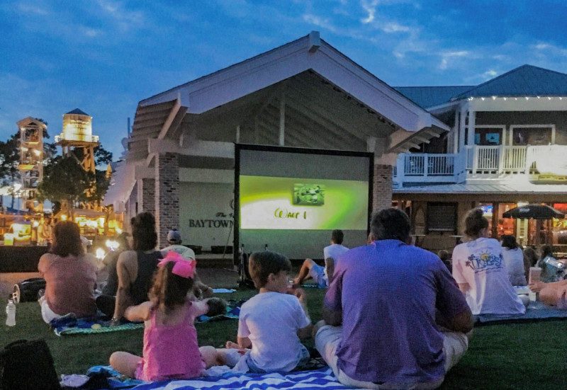 Watching a movie on the lawn at Baytowne Wharf Sandestin