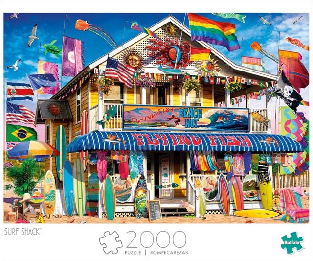 Beach themed puzzle with colorful flying kites and beach decor at a beachside surf shack