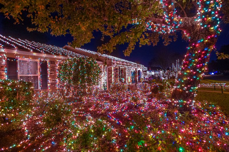 A home in Destin decorated for Christmas in colorful lights
