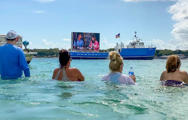 People watching Crurch Service at Crab Island in Destin
