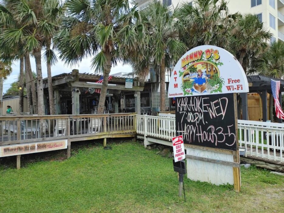 The sign for karaoke outside Kenny D's Beach Bar in Miramar Beach