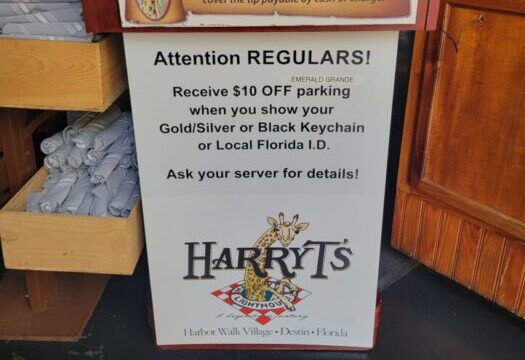 A sign about Harry T's locals parking discount 