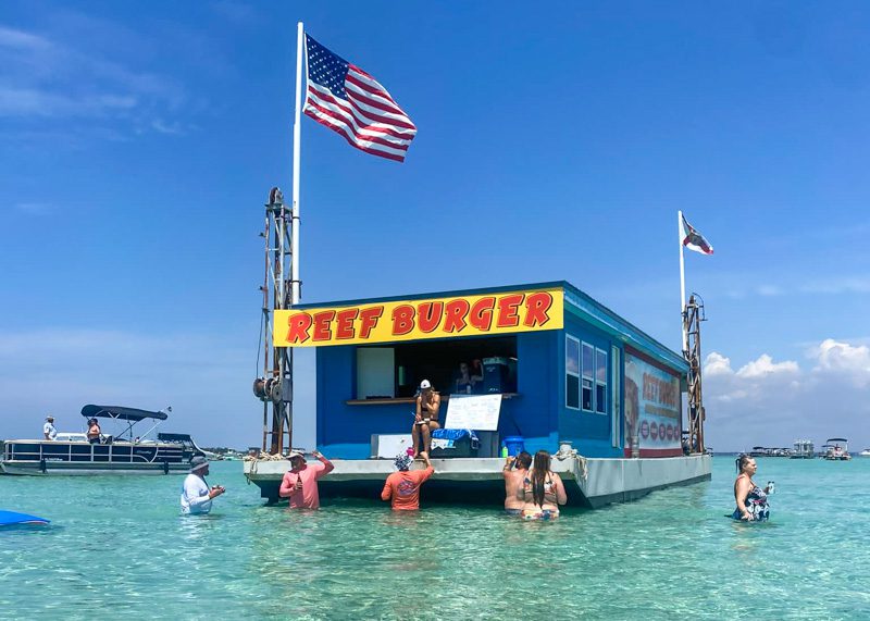 Reef Burger serving food at Crab Island in Destin Florida