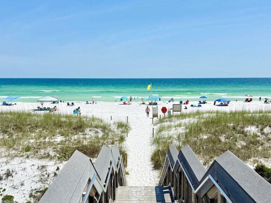 Beach area with people and chairs at Henderson Beach