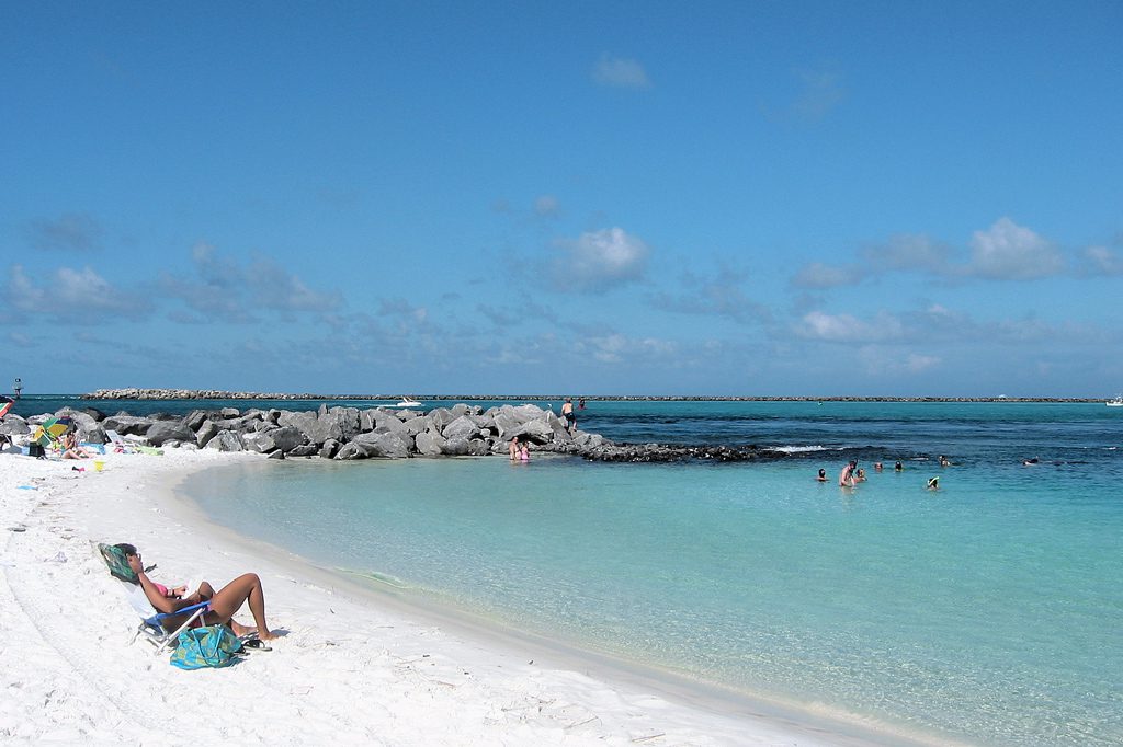 woman sunbathing at O'Steen Public Beach swimming area