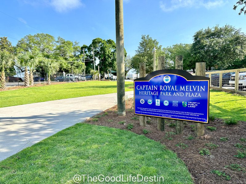 Sign at the entrance of Captain Royal Melvin Park on Destin Harbor