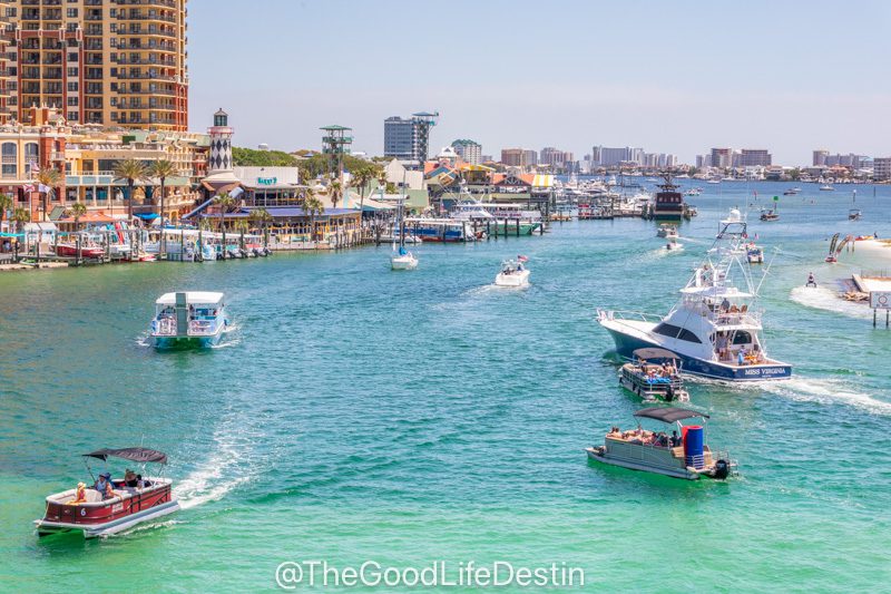 View from the Destin Bridge of boats coming and going around Harborwalk Village