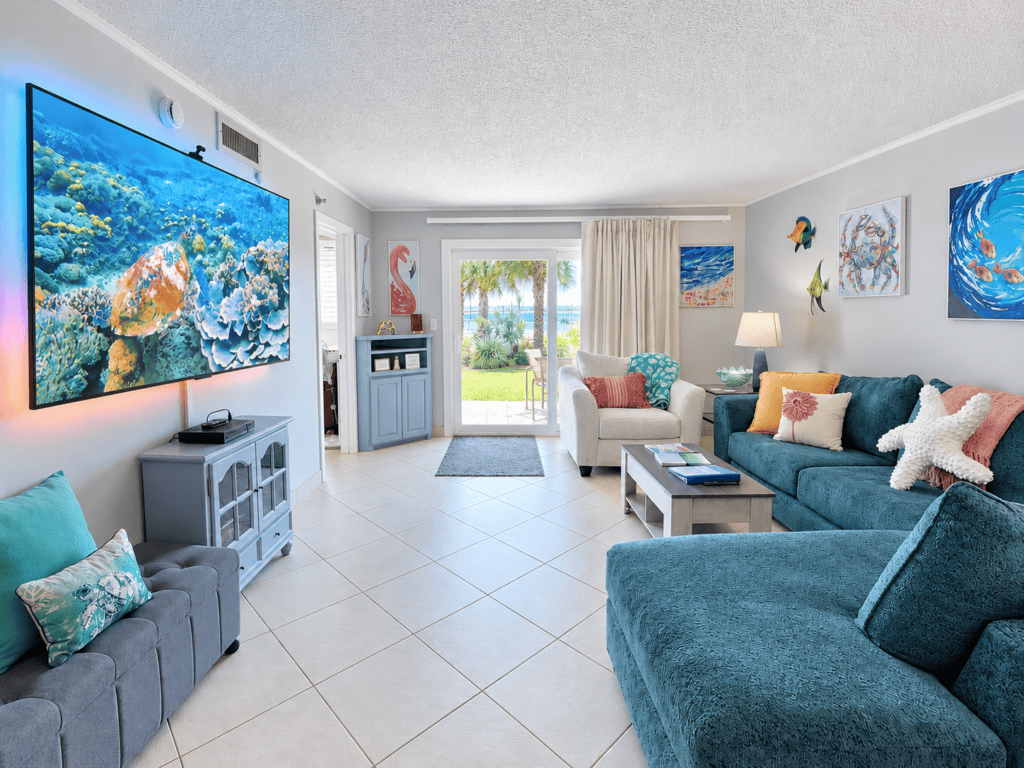 Living room with large TV on beach in Destin FL